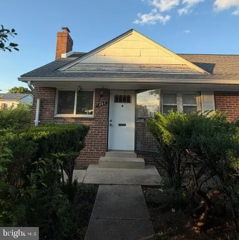 Brick home with white front door